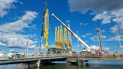 Installation of new unloading arm for liquefied recycled raw materials at Neste Porvoo refinery harbor, Finland.