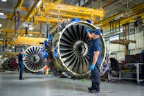 StandardAero technicians work on a CFM56 engine in the Winnipeg MRO facility.